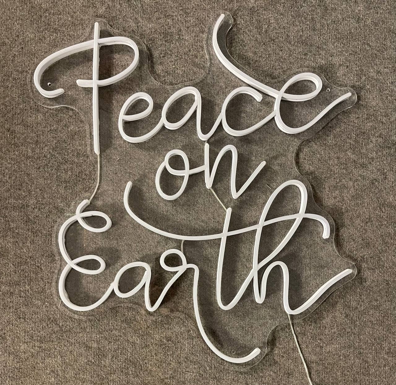 Peach on Earth Neon Sign